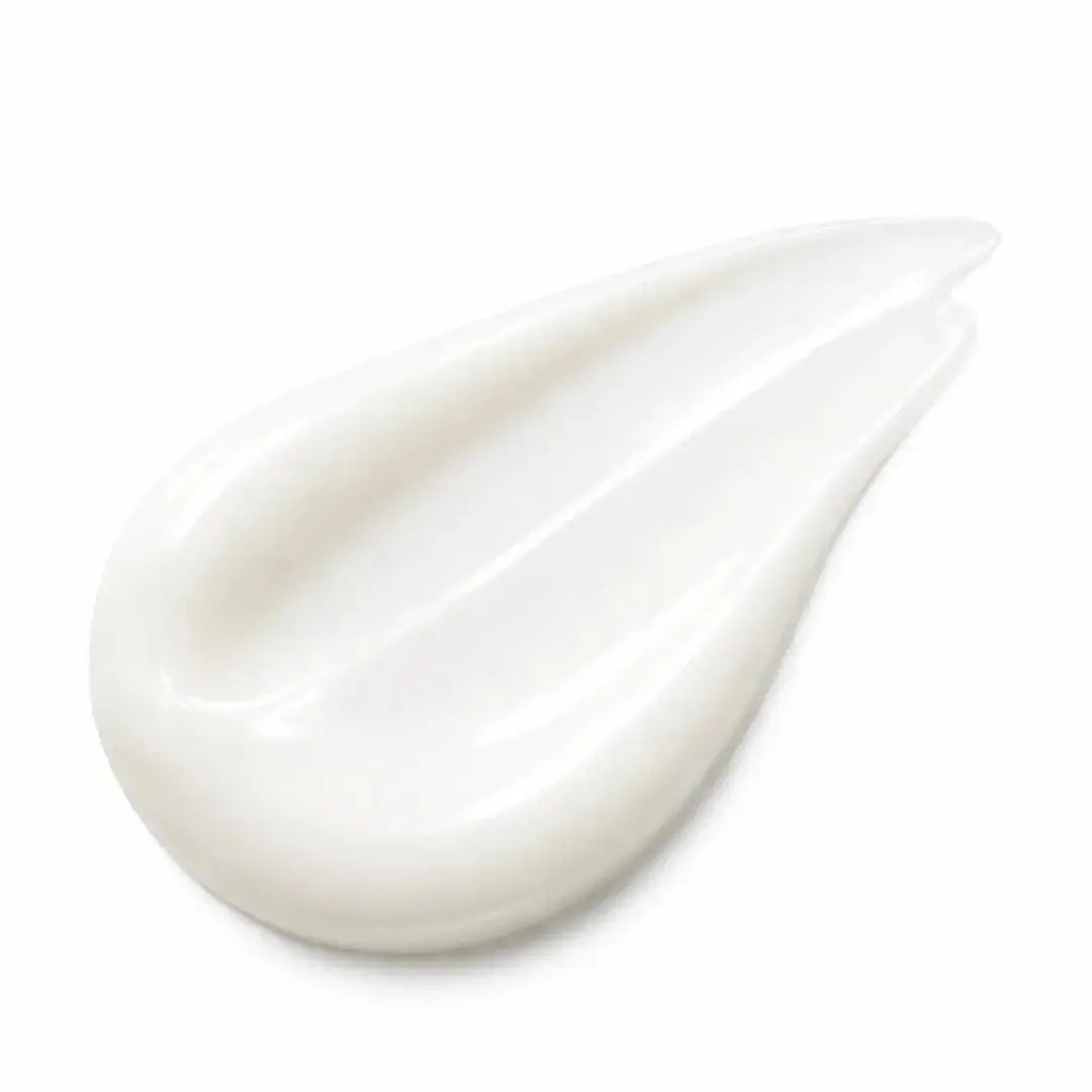 White cream droplet on a white background