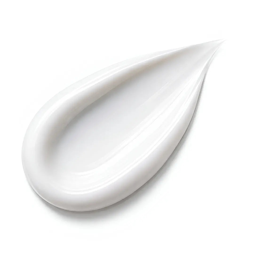 White cream in a teardrop shape on a white background