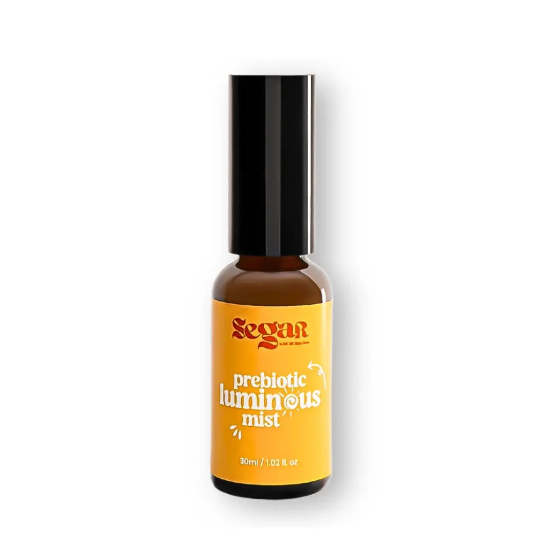 Bottle of 'prebiotic luminous mist' with a yellow label on a white background