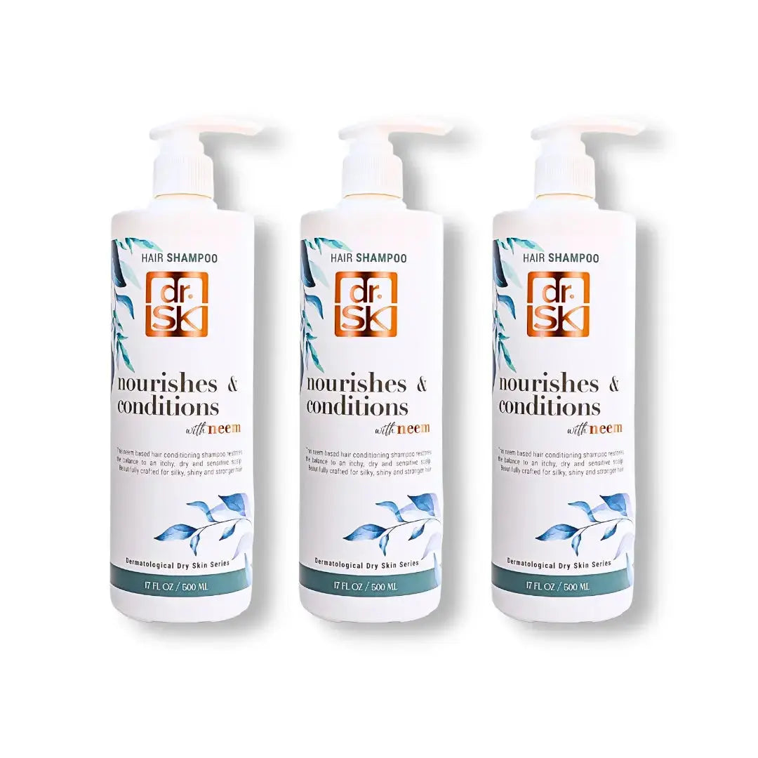 Three bottles of dr.SK Neem hair shampoo on a white background